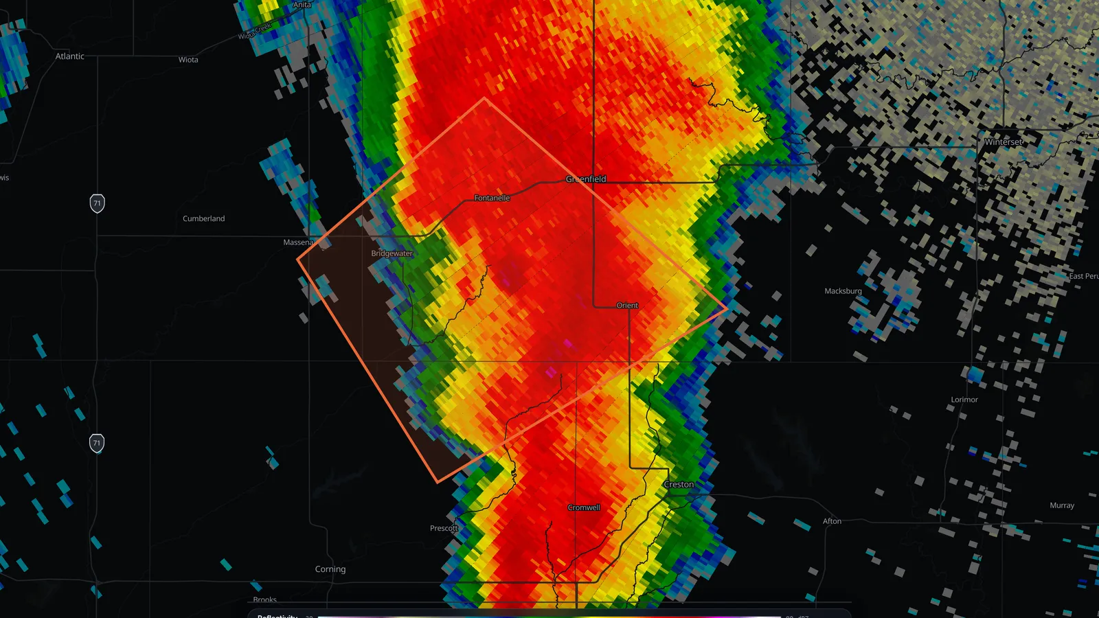 Radar reflectivity from KDMX showing a supercell with a hook echo southwest of Greenfield, Iowa, and an orange tornado warning polygon drawn around the storm's path from Bridgewater to Greenfield and Orient.