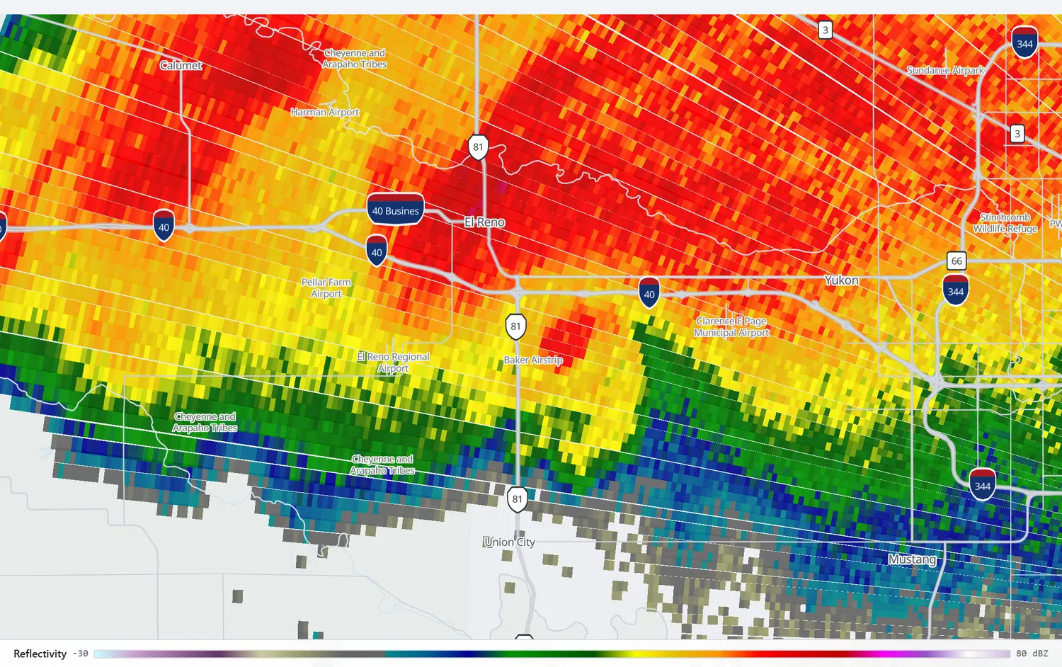 Radar reflectivity over El Reno showing a notch of lower reflectivity cutting in from the southeast and an isolated high-reflectivity core at its tip, near Baker Airstrip.