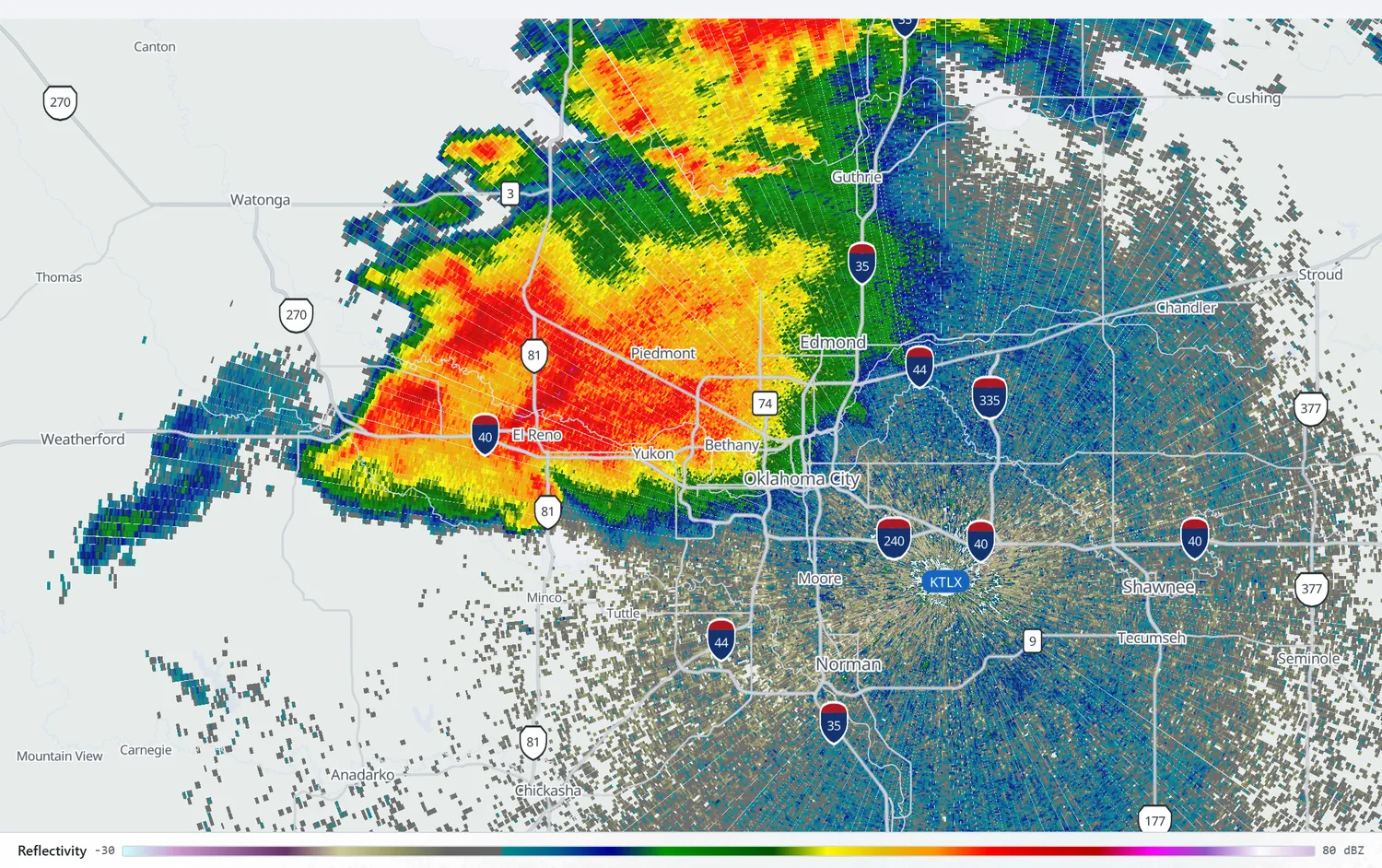 Wide radar reflectivity view showing the supercell west of Oklahoma City, with El Reno under the storm and the metro area directly ahead of it.