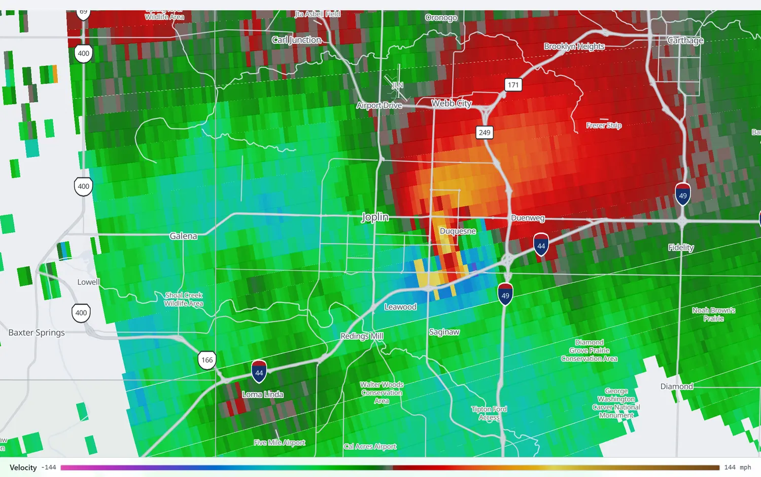 Radar velocity showing adjacent areas of strong inbound and outbound motion over Joplin.