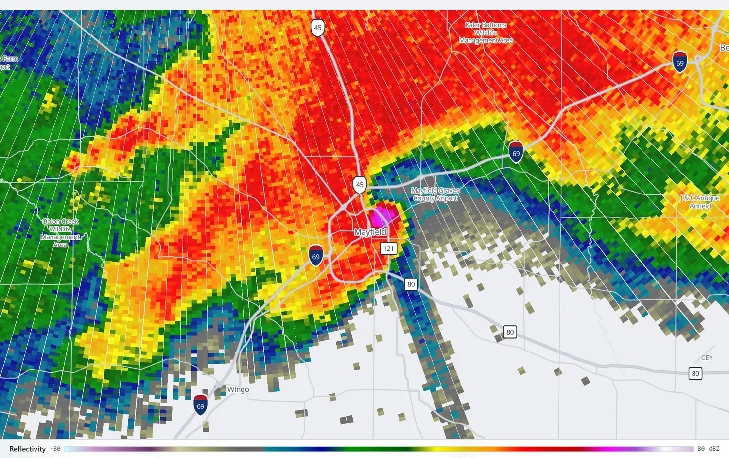 Radar reflectivity showing a hook echo over Mayfield with a bright debris core.