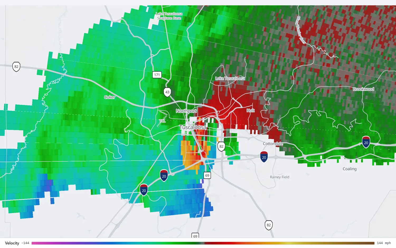 Radar velocity showing a strong couplet of opposing motion over Tuscaloosa.
